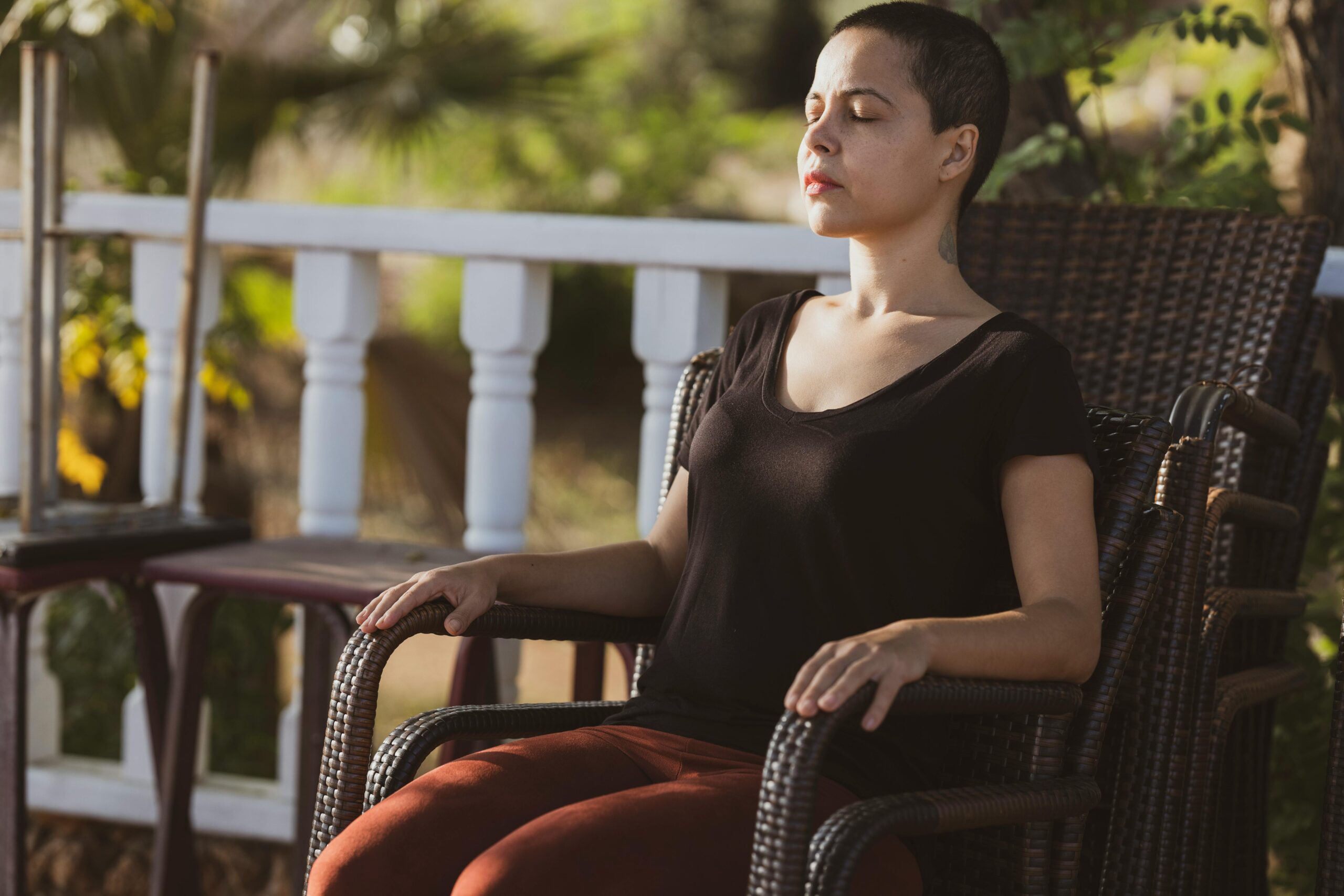 woman meditating on chair
